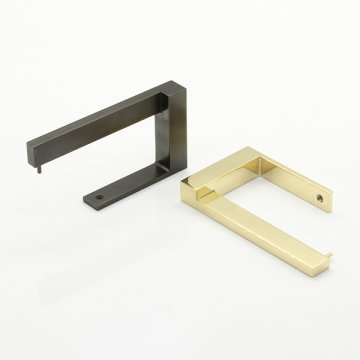 Cut solid brass toilet roll holder