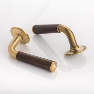 Darlington I solid brass door lever handle with hand stitched leather & traditional rose