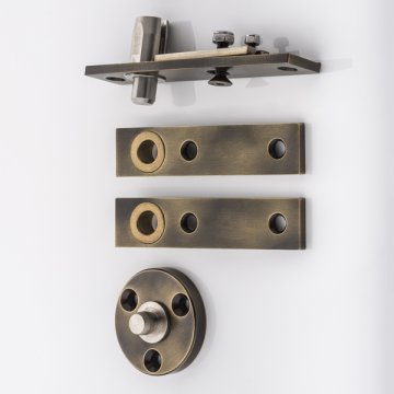 Double action floor mounted door pivot hinge set