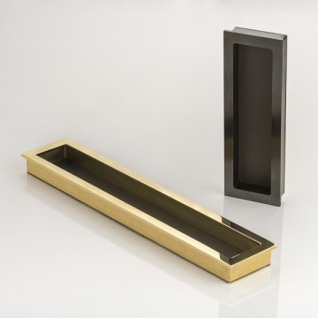 Rectangular solid brass recessed pull with bridle leather