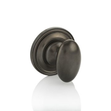 Oval thumb turn with ridged rose