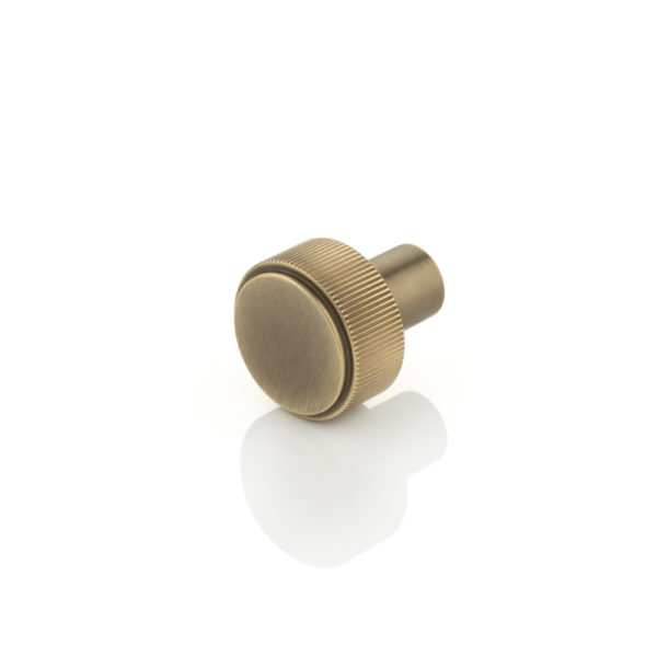Montgomery solid brass cabinet pull with linear knurl