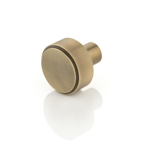 Montgomery solid brass cabinet pull with linear knurl