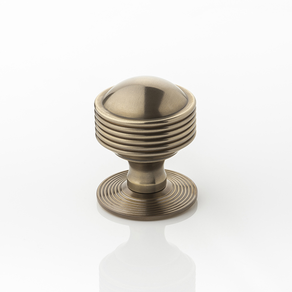 Hurleigh solid brass door knob with reeded rose