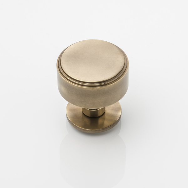 Bartlett solid brass door knob with round rose