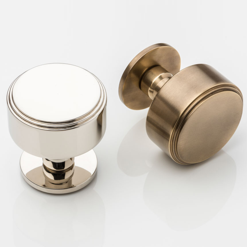 Bartlett solid brass door knob with round rose