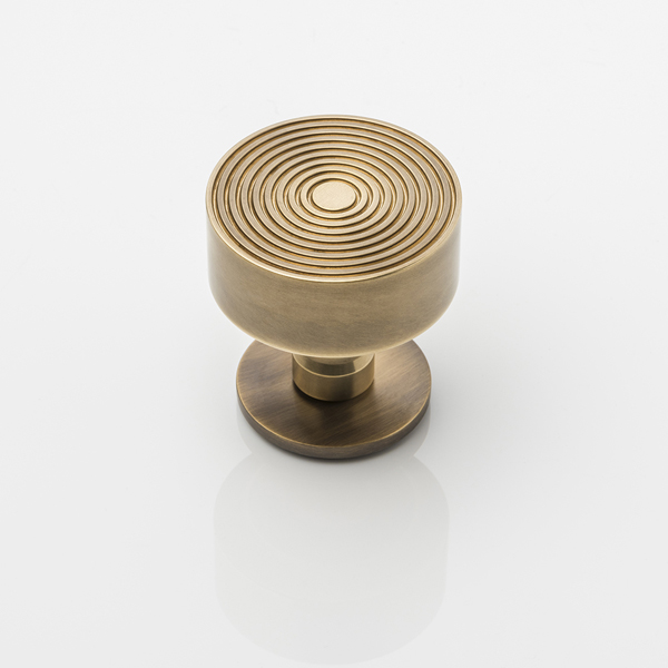 Fowler solid brass door knob with round rose