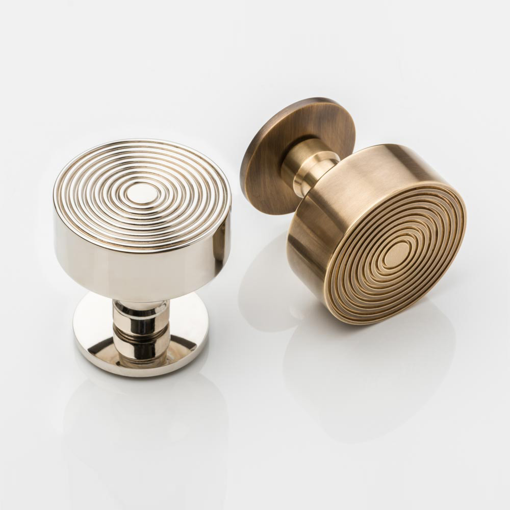 Fowler solid brass door knob with round rose
