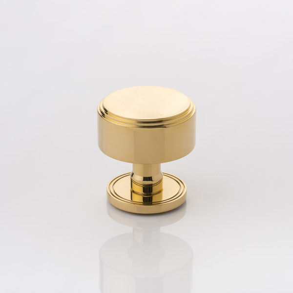 Bartlett II solid brass door knob with grooved rose