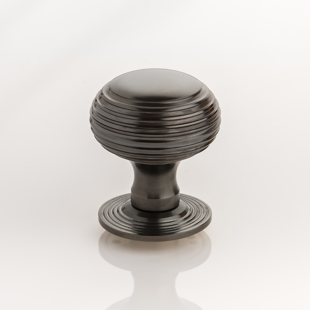 Berenice solid brass door knob with reeded rose