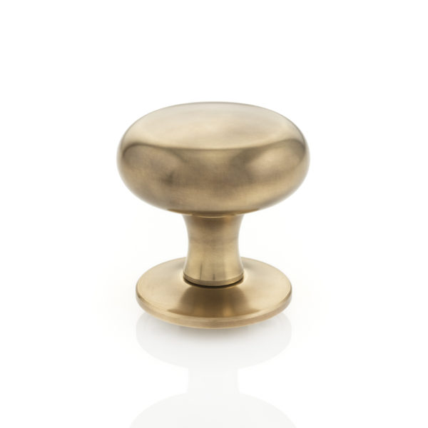Winfield solid brass door knob with tapered rose