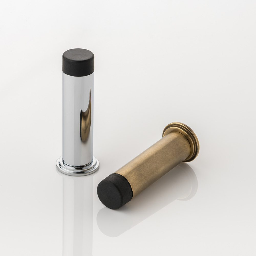 Round solid brass wall-mounted door stopper with decorative stepped plate