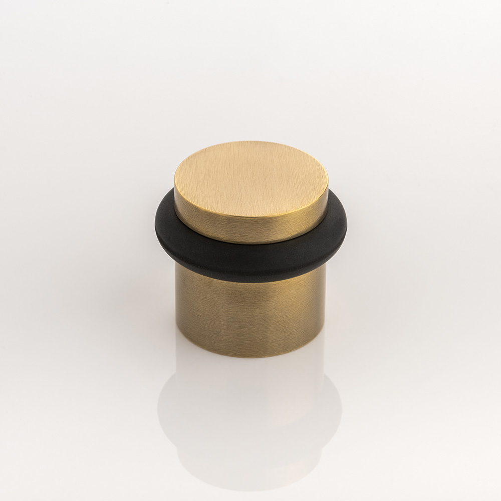 Solid brass floor mounted door stop