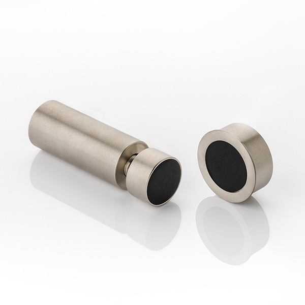 Solid brass wall-mounted magnetic door stop with leather