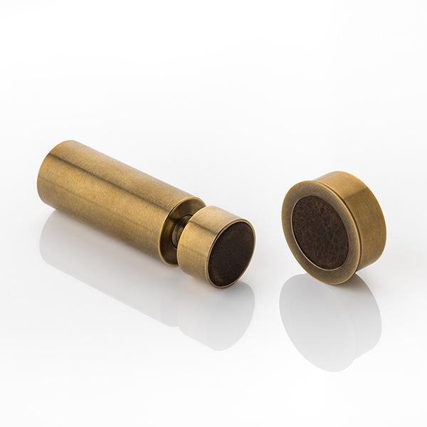 Solid brass wall-mounted magnetic door stop with leather