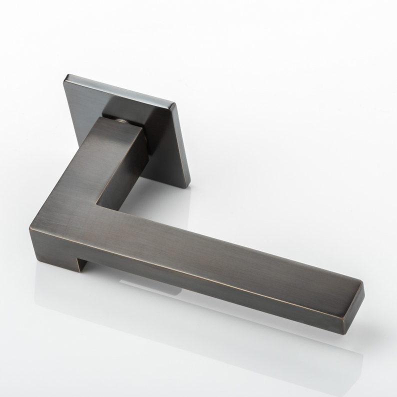 Cut solid brass door lever handle with square rose