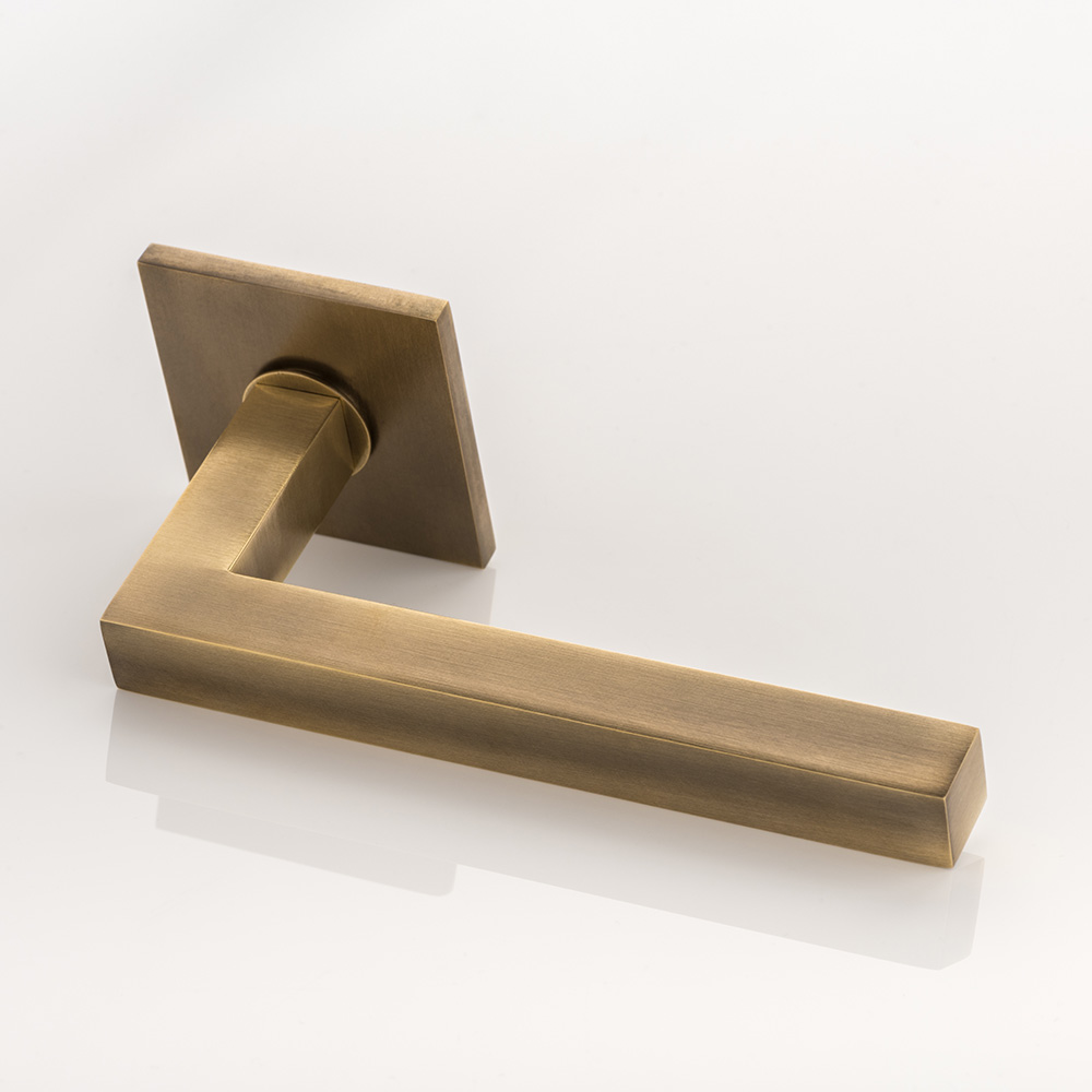 Cube junior solid brass door lever handle with square rose