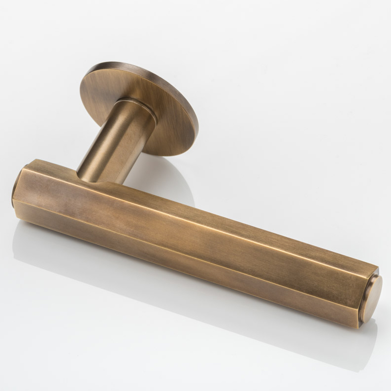 Theodore solid brass door lever handle with round rose