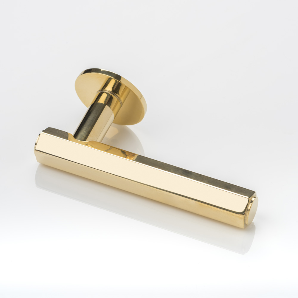 Theodore solid brass door lever handle with round rose