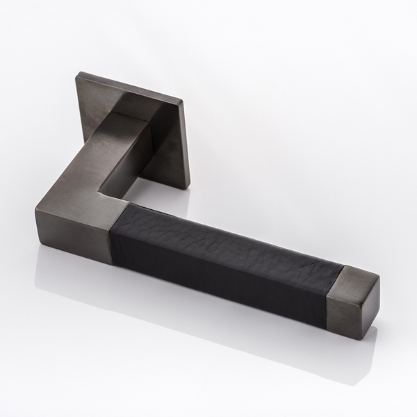Cube solid brass door lever handle with hand stitched leather & square rose