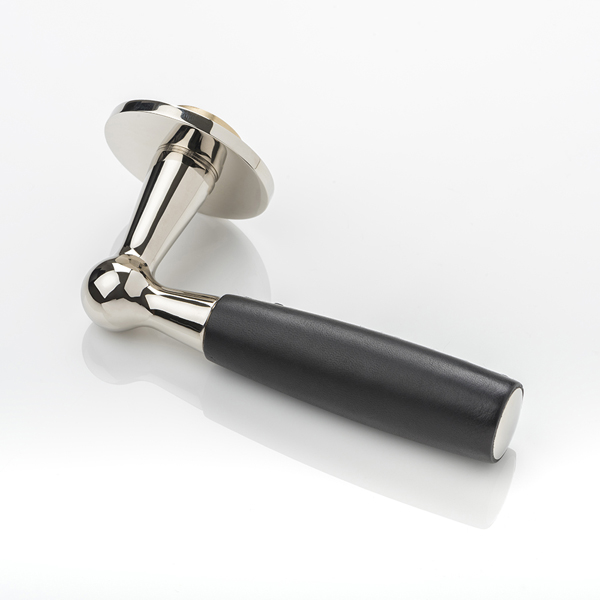 Bennett solid brass door lever handle with hand stitched leather & round rose