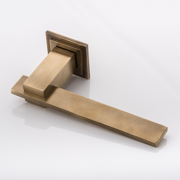 Holmes II solid brass door lever handle with square stepped rose