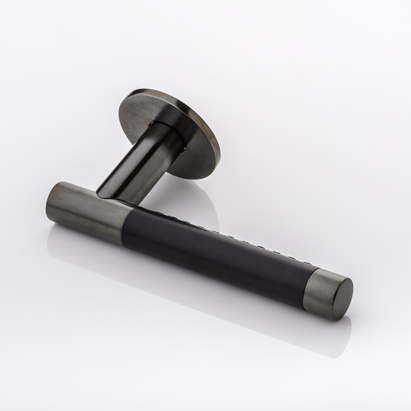 Bedford solid brass door lever handle with hand stitched leather & round rose