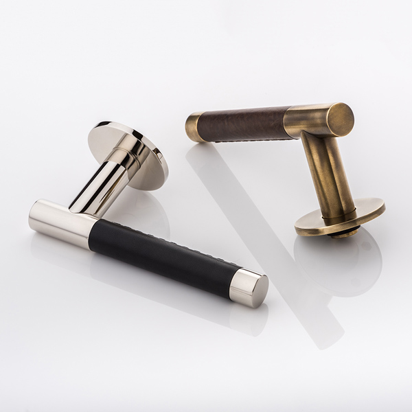 Bedford solid brass door lever handle with hand stitched leather & round rose