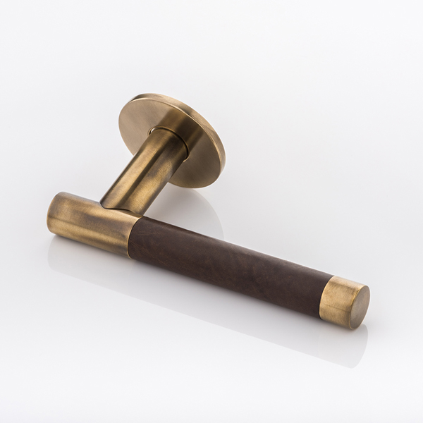 Bedford solid brass door lever handle with hand stitched leather & round rose