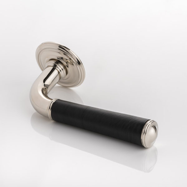 Darlington II solid brass door lever handle with hand stitched leather & ornate rose