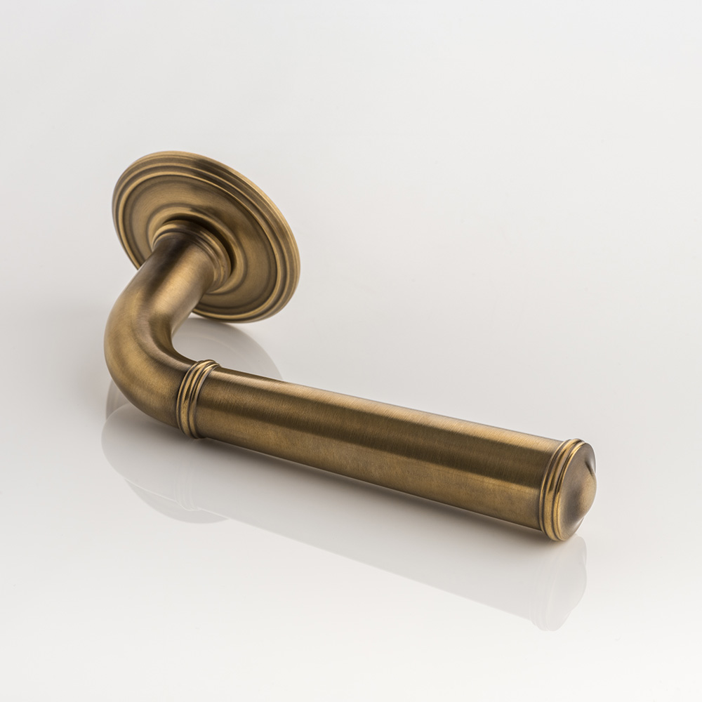 Darlington II solid brass door lever handle with ornate rose