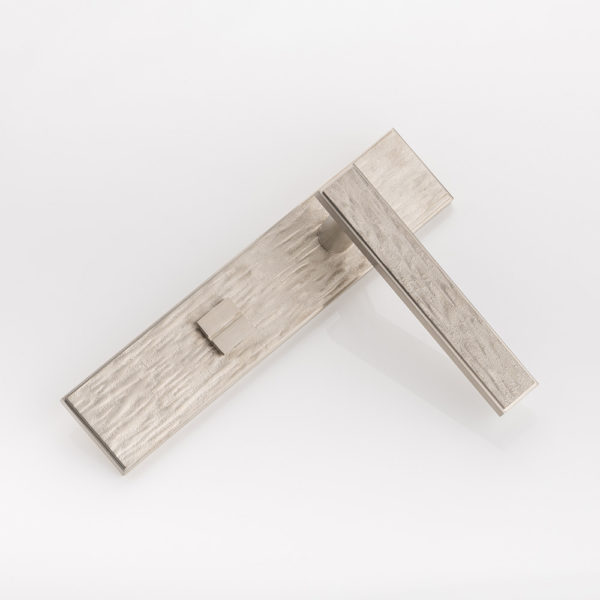 Molten texture solid bronze door lever handle with privacy backplate