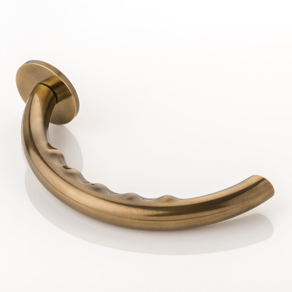 Infinity solid brass door lever handle with round rose