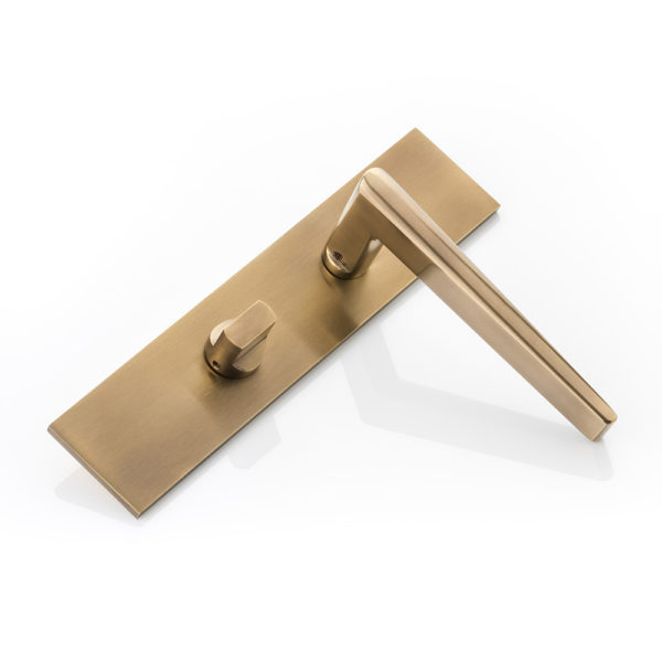 Wedge door lever handle with backplate and privacy turn/release