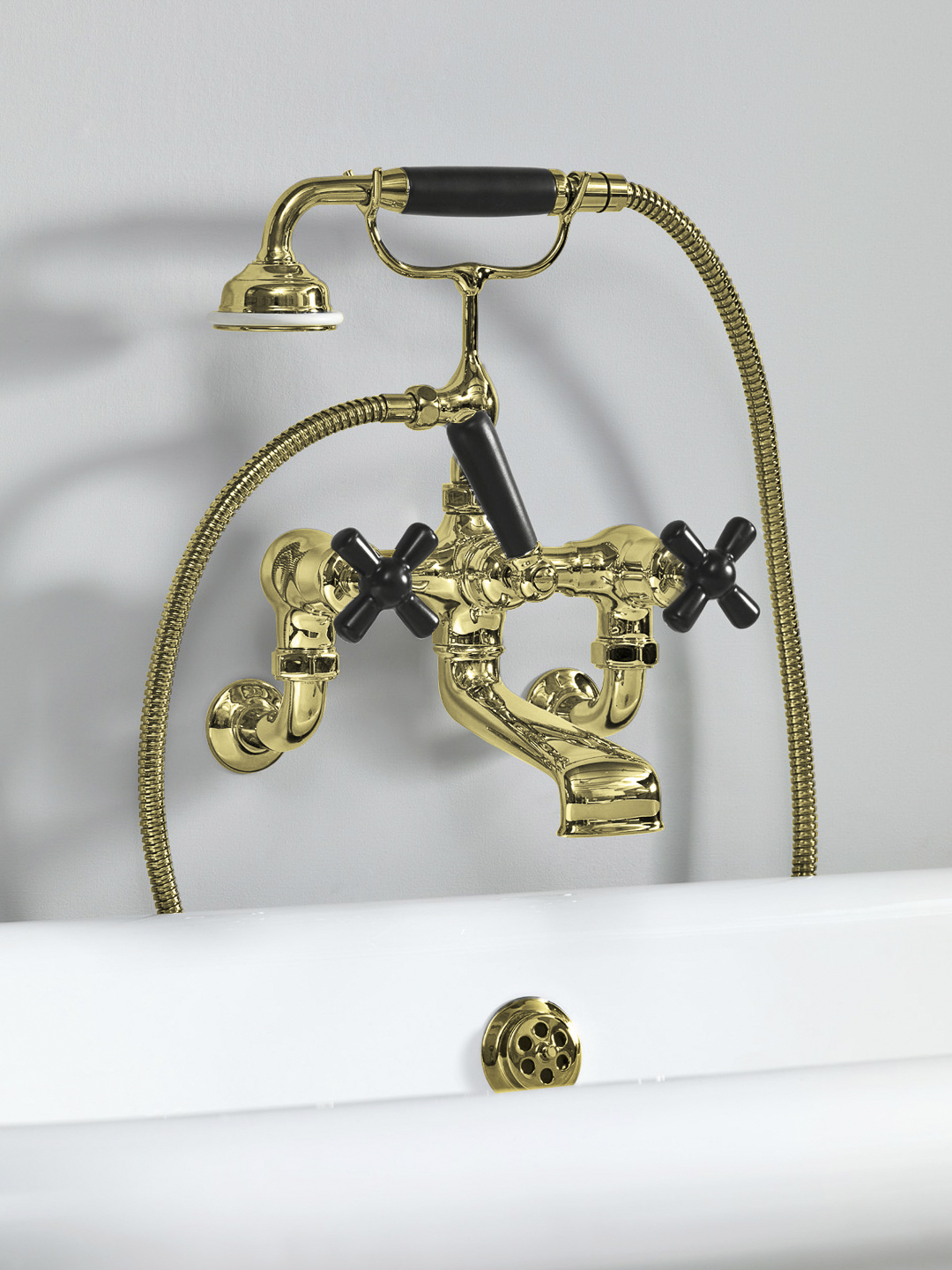 Rockwell wall-mounted bath mixer with handshower & metal/coloured crosshead taps