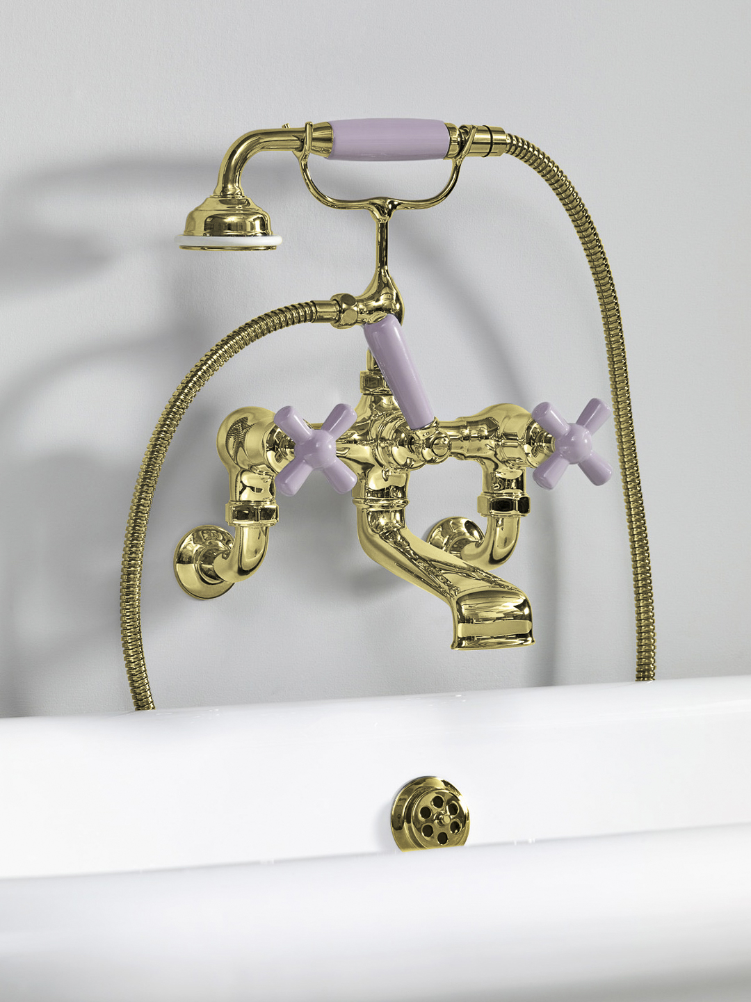 Rockwell wall-mounted bath mixer with handshower & metal/coloured crosshead taps