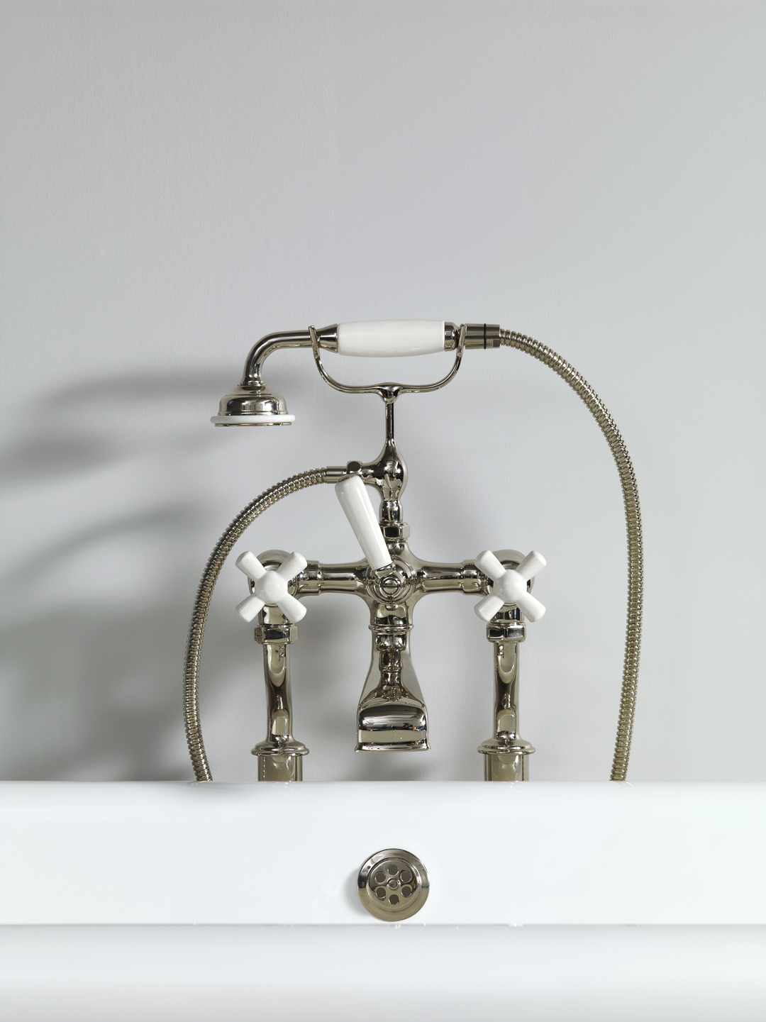 Rockwell bath filler on floorlegs with metal/coloured crosshead taps for Rockwell bath with feet