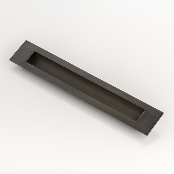 Collett solid brass recessed pull with leather