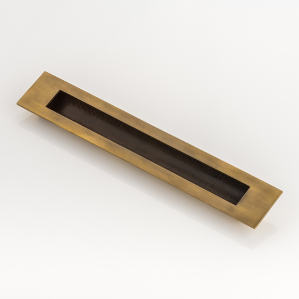 Collett solid brass recessed pull with leather