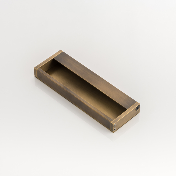 Rectangular solid brass recessed pull with grip