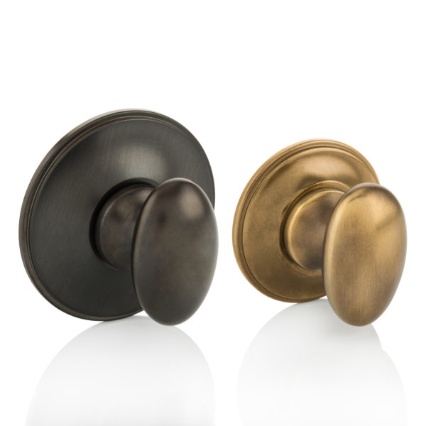 Oval thumb turn with traditional rose