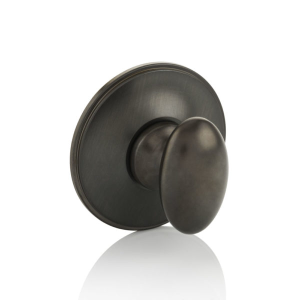 Oval thumb turn with traditional rose