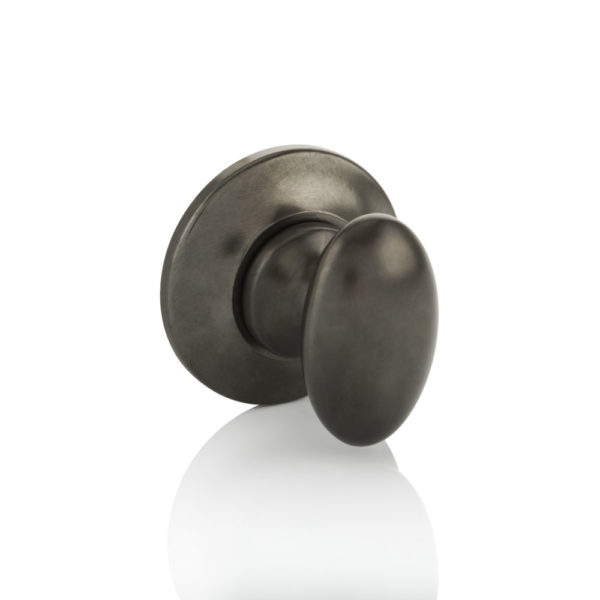 Oval thumb turn with tapered rose