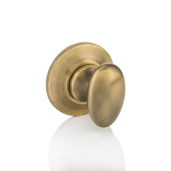 Oval thumb turn with tapered rose