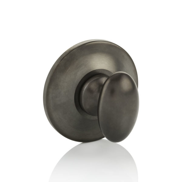 Oval thumb turn with tapered rose