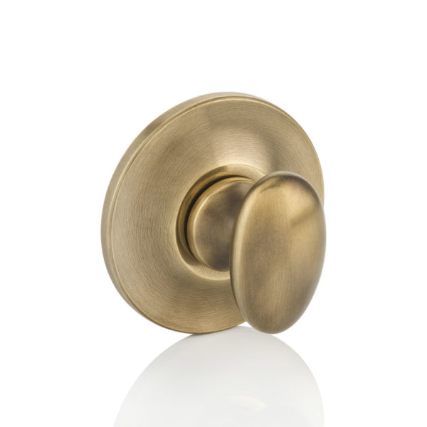 Oval thumb turn with tapered rose