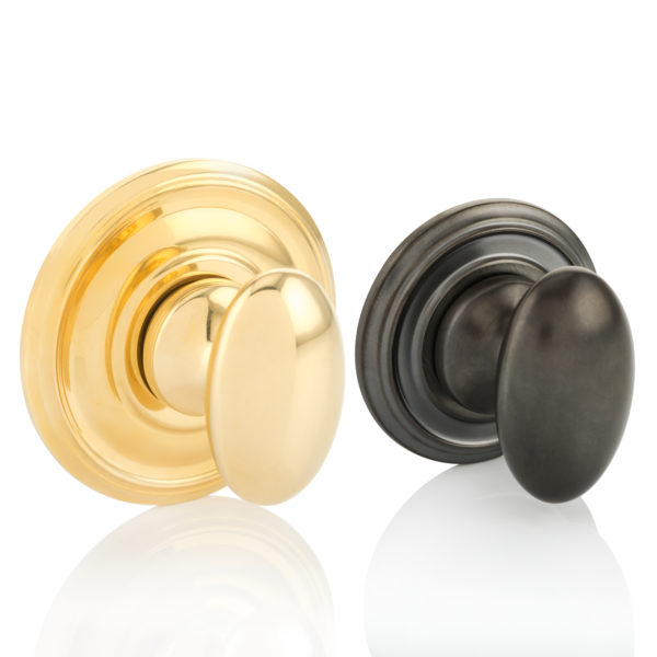 Oval thumb turn with ornate rose