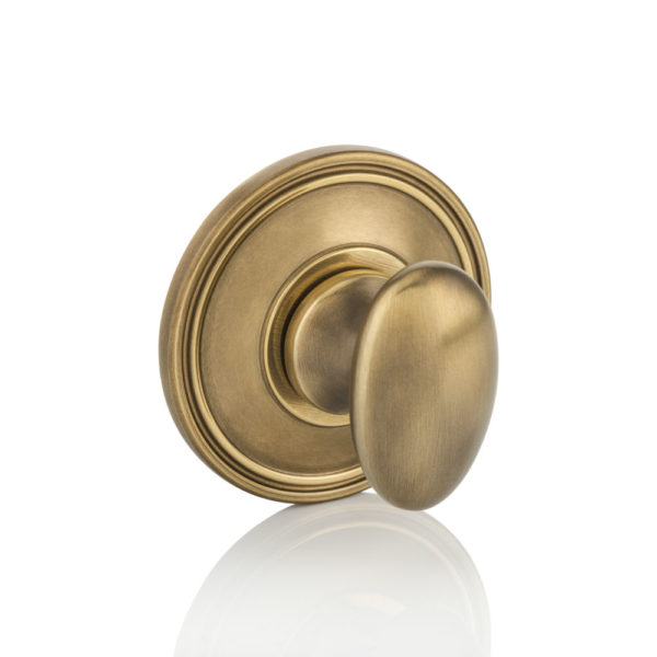 Oval thumb turn with ridged rose