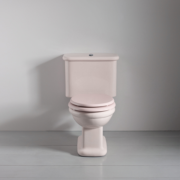 Rockwell toilet with close-coupled cistern & pan w horizontal outlet in Pale Pink
