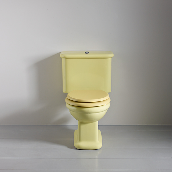 Rockwell toilet with close-coupled cistern & pan w horizontal outlet in Sherbet Yellow